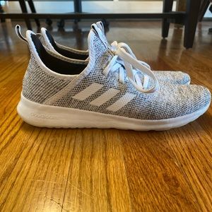 Women’s white adidas sneakers